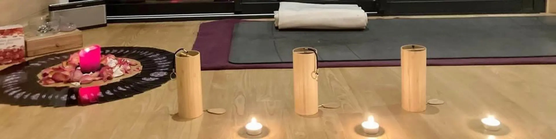 Yoga ceremony with candles and accessories