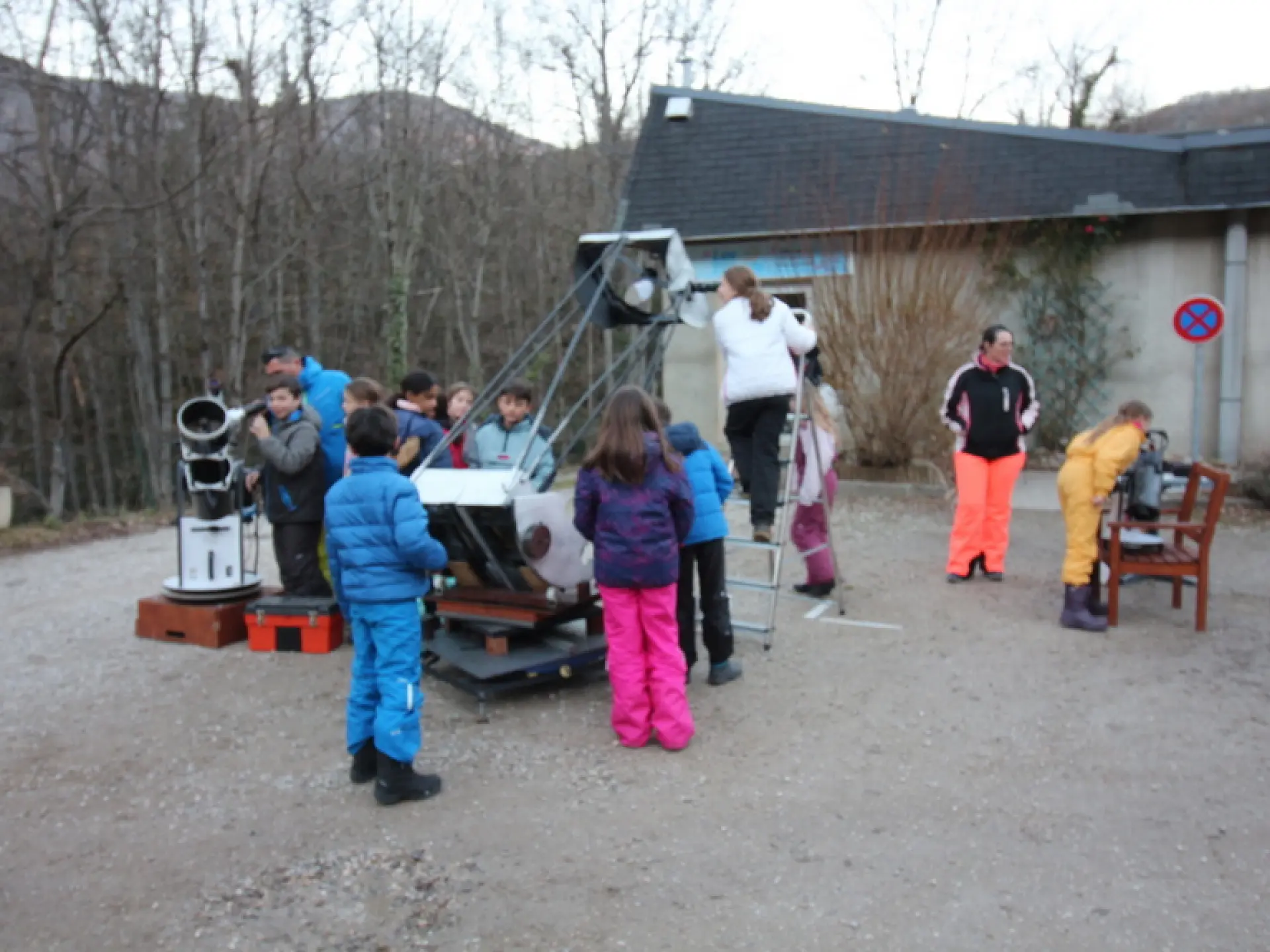 Children using telescopes during an astronomy workshop